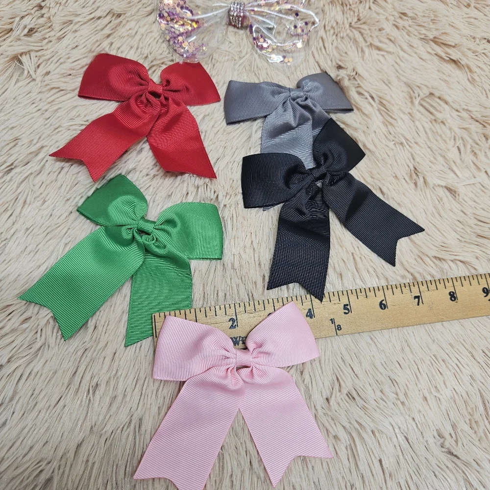 Girls' hair clip bows, solid colors.